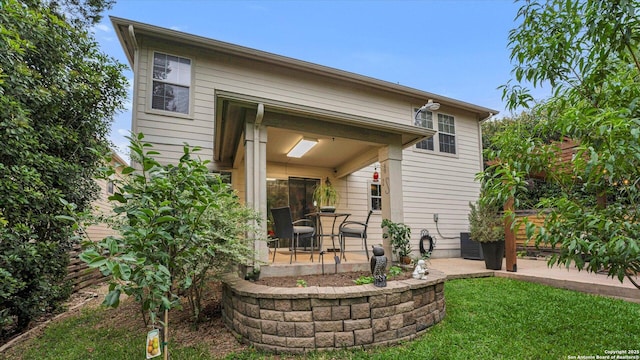 6139 Mackenzie, San Antonio, TX 78247 - back of house with a yard and a patio