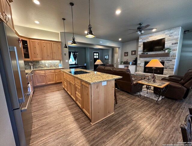 181 Crazy Horse, Canyon Lake, TX 78133 - kitchen with freestanding refrigerator, open floor plan, a ceiling fan, dark wood-style flooring, and recessed lighting