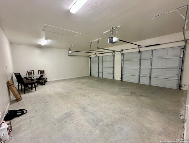 181 Crazy Horse, Canyon Lake, TX 78133 - garage featuring a garage door opener