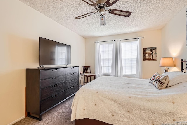 14343 Judson Unit 303, San Antonio, TX 78233 - bedroom featuring a textured ceiling, ceiling fan, and carpet floors