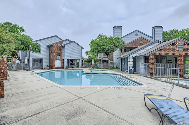 14343 Judson Unit 303, San Antonio, TX 78233 - pool with a hot tub, fence, and a patio area