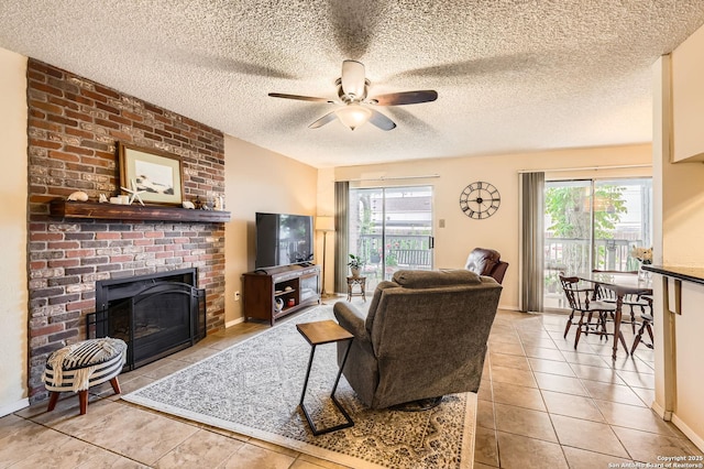 14343 Judson Unit 303, San Antonio, TX 78233 - living room with light tile patterned floors, a textured ceiling, a healthy amount of sunlight, and a ceiling fan