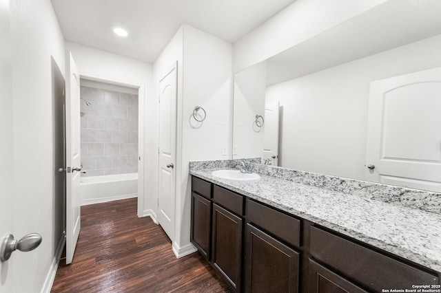 15102 Jetfire, Von Ormy, TX 78073 - full bath featuring shower / washtub combination, wood finished floors, vanity, recessed lighting, and baseboards