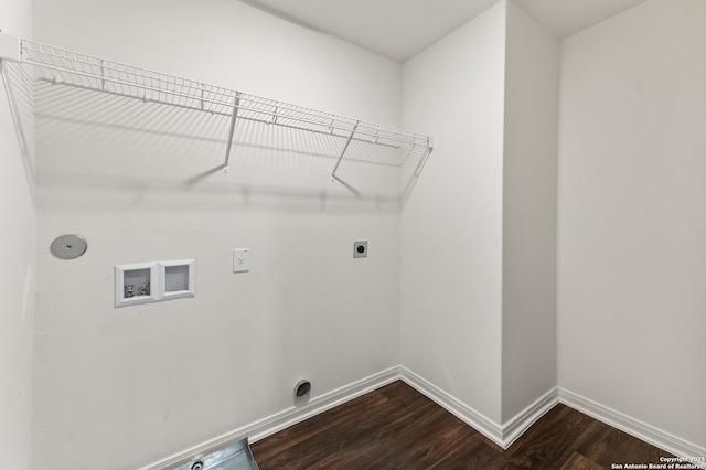 15102 Jetfire, Von Ormy, TX 78073 - clothes washing area featuring laundry area, hookup for an electric dryer, dark wood-type flooring, baseboards, and hookup for a washing machine