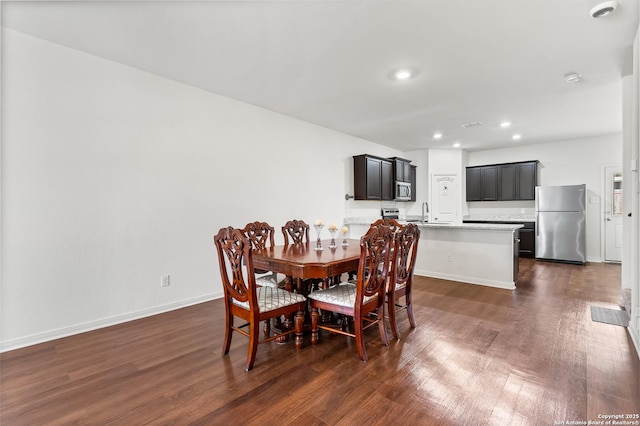15102 Jetfire, Von Ormy, TX 78073 - dining space featuring recessed lighting, baseboards, and dark wood finished floors