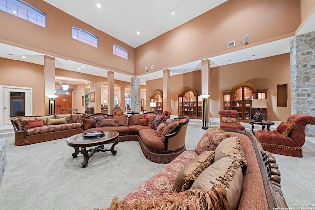 26118 Alto Oaks, San Antonio, TX 78255 - carpeted living area with a high ceiling, ornate columns, and recessed lighting
