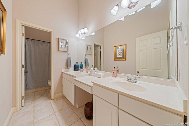 26118 Alto Oaks, San Antonio, TX 78255 - full bathroom featuring toilet, double vanity, tile patterned floors, a shower with curtain, and baseboards