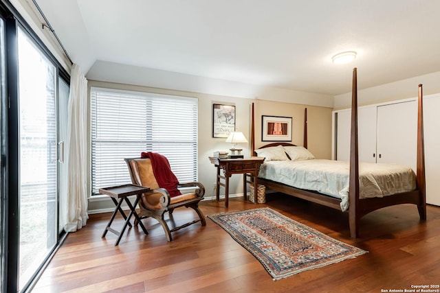 bedroom featuring wood finished floors