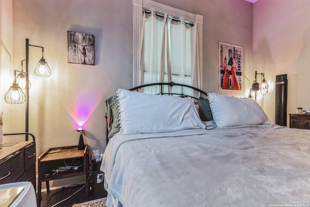 bedroom with a textured wall