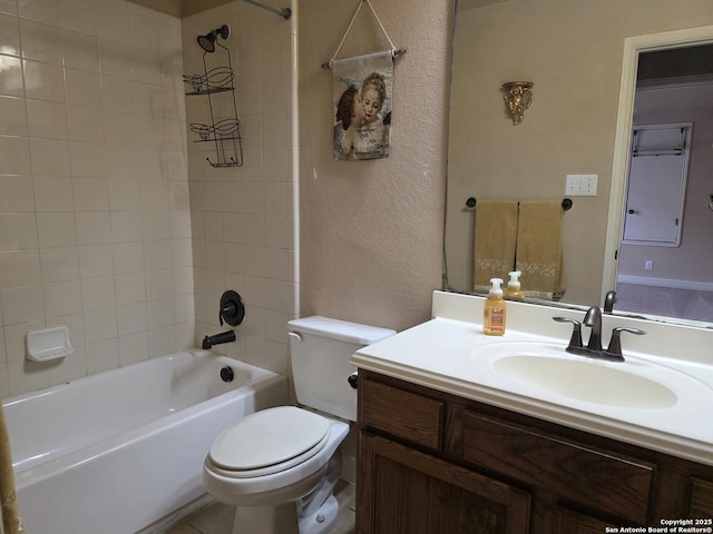 full bathroom featuring toilet, shower / bath combination, vanity, and a textured wall