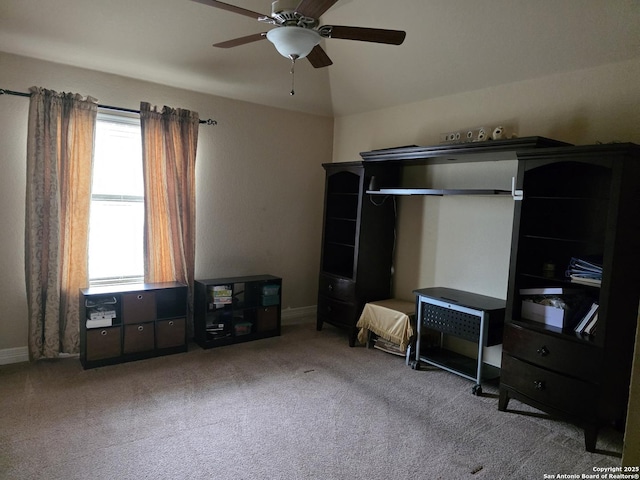 bedroom featuring carpet, baseboards, and a ceiling fan