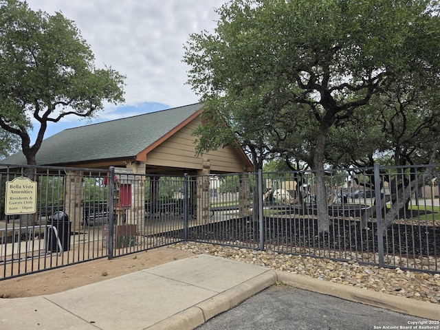 view of property's community with fence