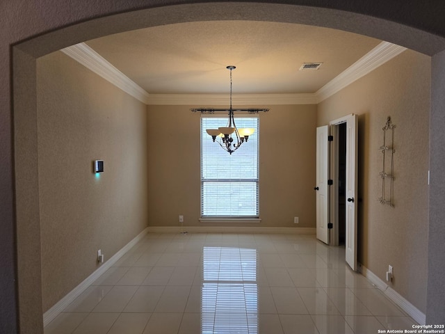 unfurnished dining area with visible vents, crown molding, arched walkways, light tile patterned floors, and a notable chandelier