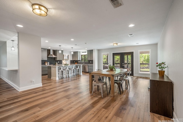 1397 Desert Gold, Boerne, TX 78006 - dining area with plenty of natural light, french doors, recessed lighting, and wood finished floors