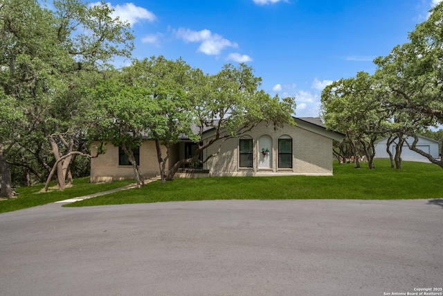 1397 Desert Gold, Boerne, TX 78006 - view of front facade with a front yard and brick siding