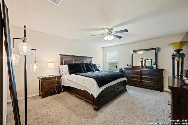 4902 Everett Loop, Converse, TX 78109 - bedroom featuring light colored carpet, baseboards, and ceiling fan