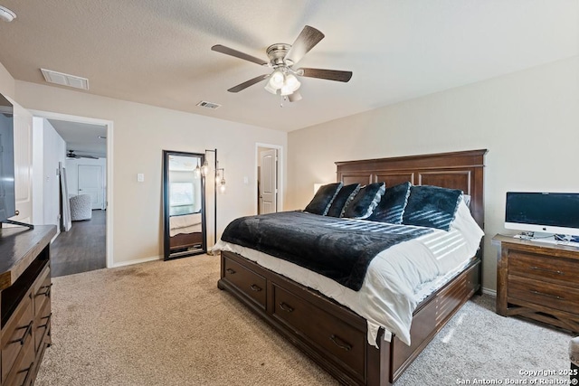 4902 Everett Loop, Converse, TX 78109 - bedroom featuring light colored carpet, visible vents, baseboards, and ceiling fan