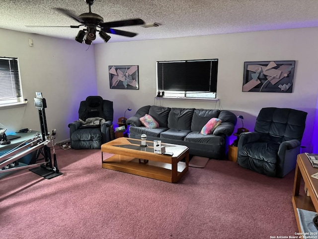 6603 Meadow Fawn, Converse, TX 78109 - carpeted living area featuring a textured ceiling and a ceiling fan