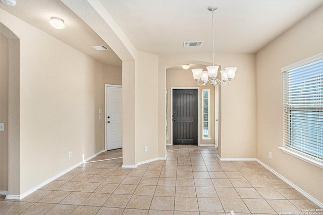 1819 Gray Fox Crk, San Antonio, TX 78245 - entrance foyer with a chandelier, plenty of natural light, light tile patterned floors, and visible vents