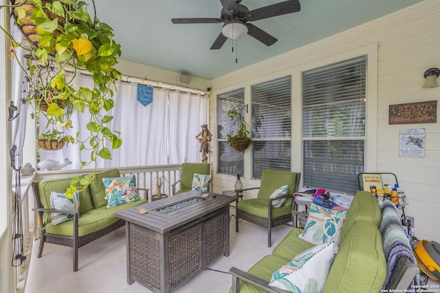 view of patio / terrace with an outdoor living space and a ceiling fan