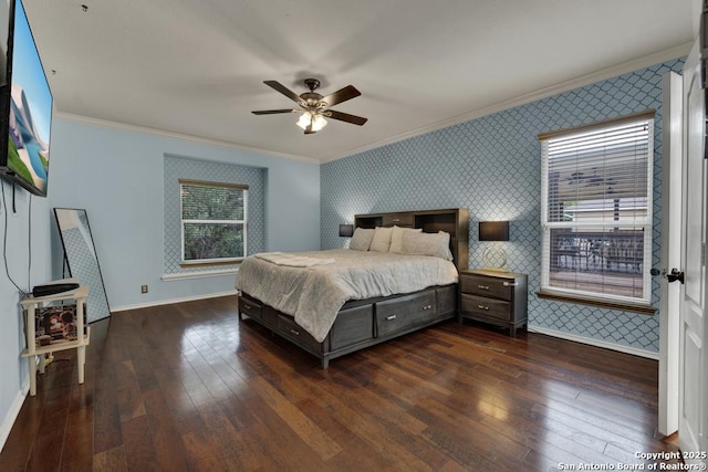 bedroom with wallpapered walls, baseboards, an accent wall, and crown molding