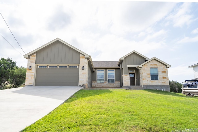 1587 Lakeshore Dr, Canyon Lake, TX 78133 - view of front of property featuring board and batten siding, stone siding, a front lawn, concrete driveway, and a garage