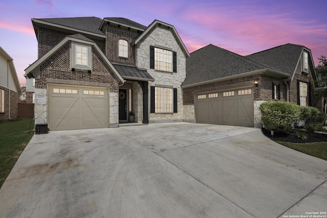 french provincial home with concrete driveway, stone siding, roof with shingles, and an attached garage