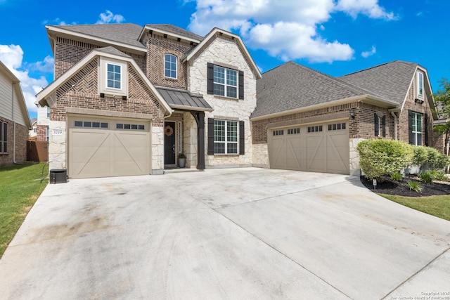 view of front of home with concrete driveway, an attached garage, and stone siding
