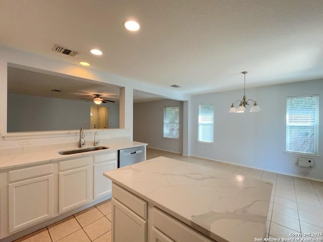 kitchen featuring a sink, visible vents, dishwasher, light tile patterned flooring, and recessed lighting