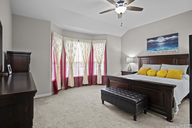 bedroom featuring ceiling fan, lofted ceiling, carpet flooring, and baseboards