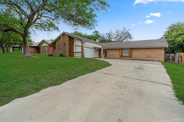 13018 Larkyorke, San Antonio, TX 78233 - mid-century modern home with a garage, fence, a front lawn, concrete driveway, and brick siding