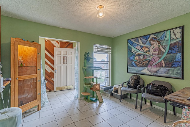 13018 Larkyorke, San Antonio, TX 78233 - living area featuring tile patterned flooring and a textured ceiling