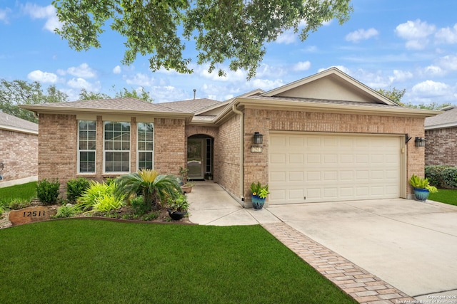 ranch-style house with roof with shingles, brick siding, concrete driveway, a garage, and a front yard