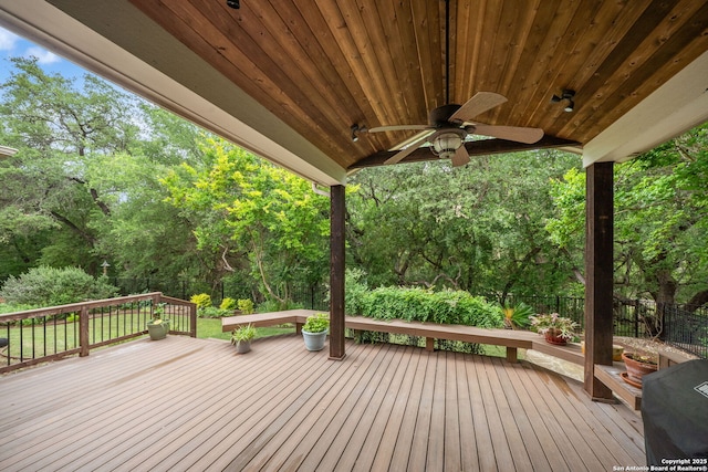 deck featuring fence and ceiling fan