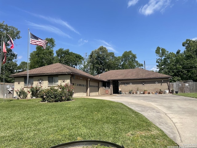 310 Seven Seas, Crosby, TX 77532 - single story home featuring concrete driveway, fence, an attached garage, and a front yard
