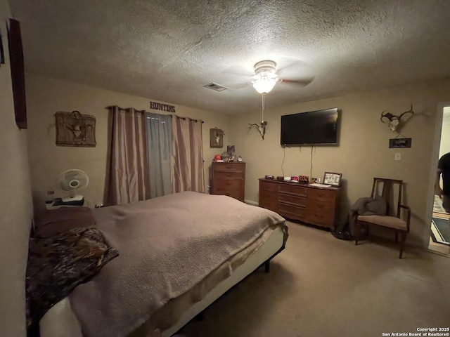 310 Seven Seas, Crosby, TX 77532 - carpeted bedroom with ceiling fan, visible vents, and a textured ceiling