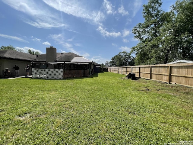 310 Seven Seas, Crosby, TX 77532 - view of yard with a fenced backyard