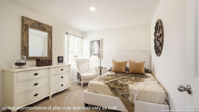 bedroom with light carpet