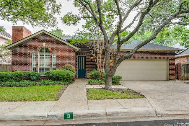 9 Waldenshire, San Antonio, TX 78209 - ranch-style home featuring an attached garage, a chimney, brick siding, and driveway