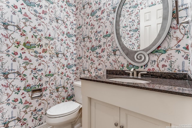 9 Waldenshire, San Antonio, TX 78209 - bathroom with toilet, vanity, and wallpapered walls