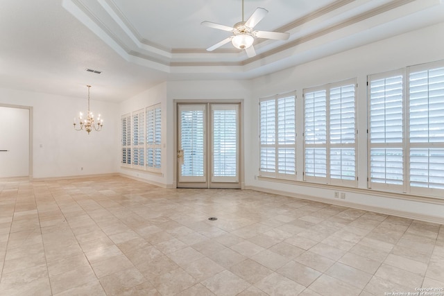 9 Waldenshire, San Antonio, TX 78209 - spare room with a tray ceiling, light tile patterned floors, ceiling fan with notable chandelier, and ornamental molding