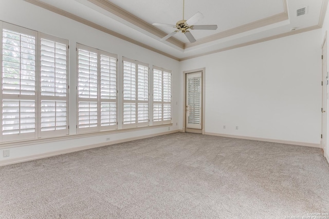 9 Waldenshire, San Antonio, TX 78209 - carpeted empty room featuring a ceiling fan, a tray ceiling, baseboards, visible vents, and crown molding