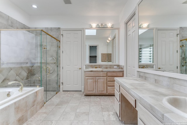 9 Waldenshire, San Antonio, TX 78209 - bathroom with a shower stall, vanity, visible vents, and a bath