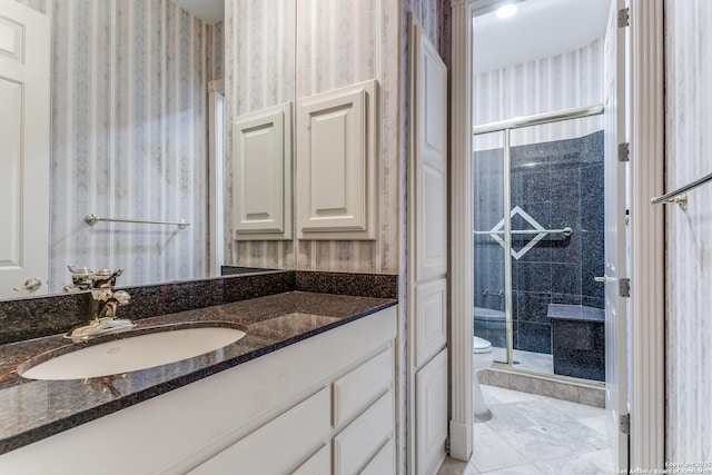 9 Waldenshire, San Antonio, TX 78209 - bathroom featuring toilet, vanity, wallpapered walls, and a shower stall