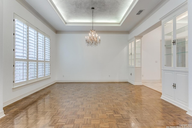 9 Waldenshire, San Antonio, TX 78209 - empty room with a raised ceiling, a notable chandelier, visible vents, and plenty of natural light