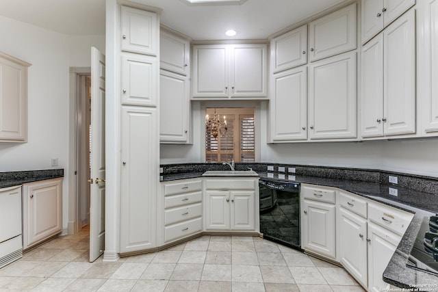 9 Waldenshire, San Antonio, TX 78209 - kitchen featuring a sink, white dishwasher, black dishwasher, and white cabinets