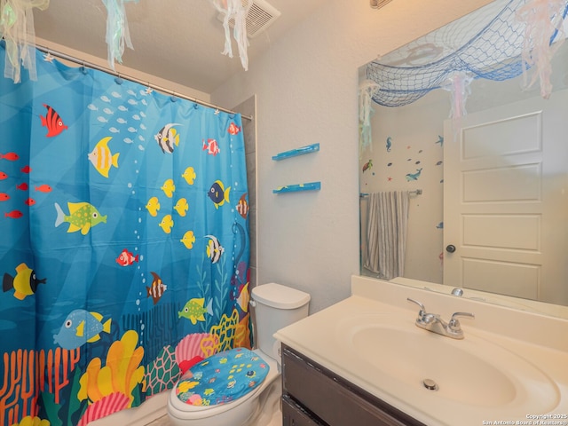 bathroom with toilet, vanity, visible vents, and curtained shower