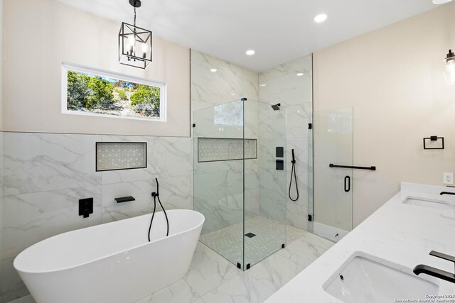 115 Heartland, Boerne, TX 78006 - full bath with a marble finish shower, marble finish floor, a freestanding bath, and a sink