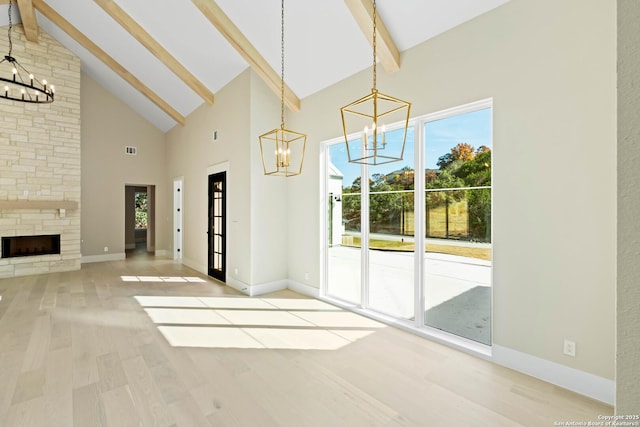 115 Heartland, Boerne, TX 78006 - unfurnished living room with high vaulted ceiling, visible vents, a chandelier, light wood-style flooring, and beamed ceiling