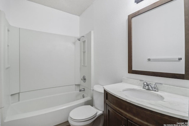 full bathroom with toilet, vanity, and shower / bathing tub combination